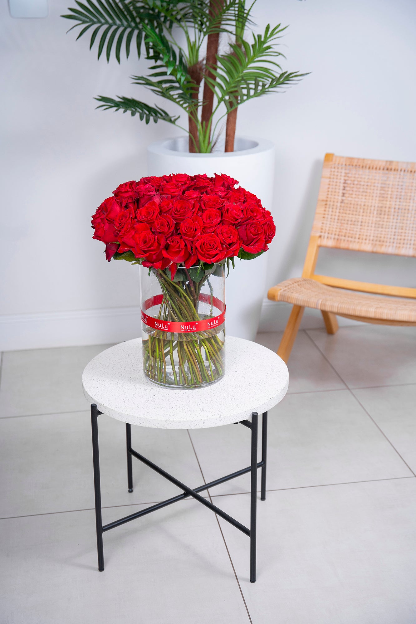 RED ROSES IN A VASE