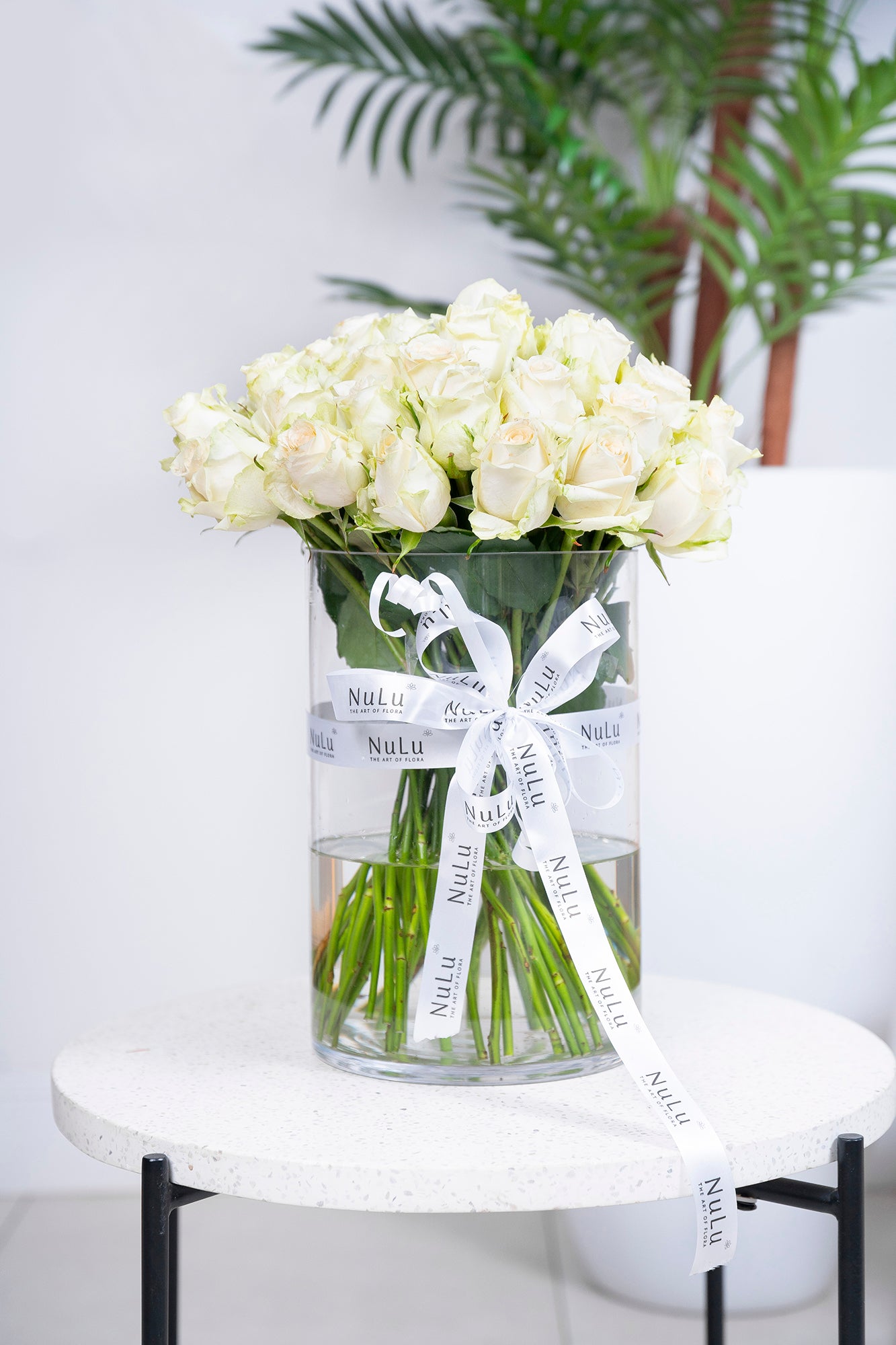 WHITE ROSES IN A VASE