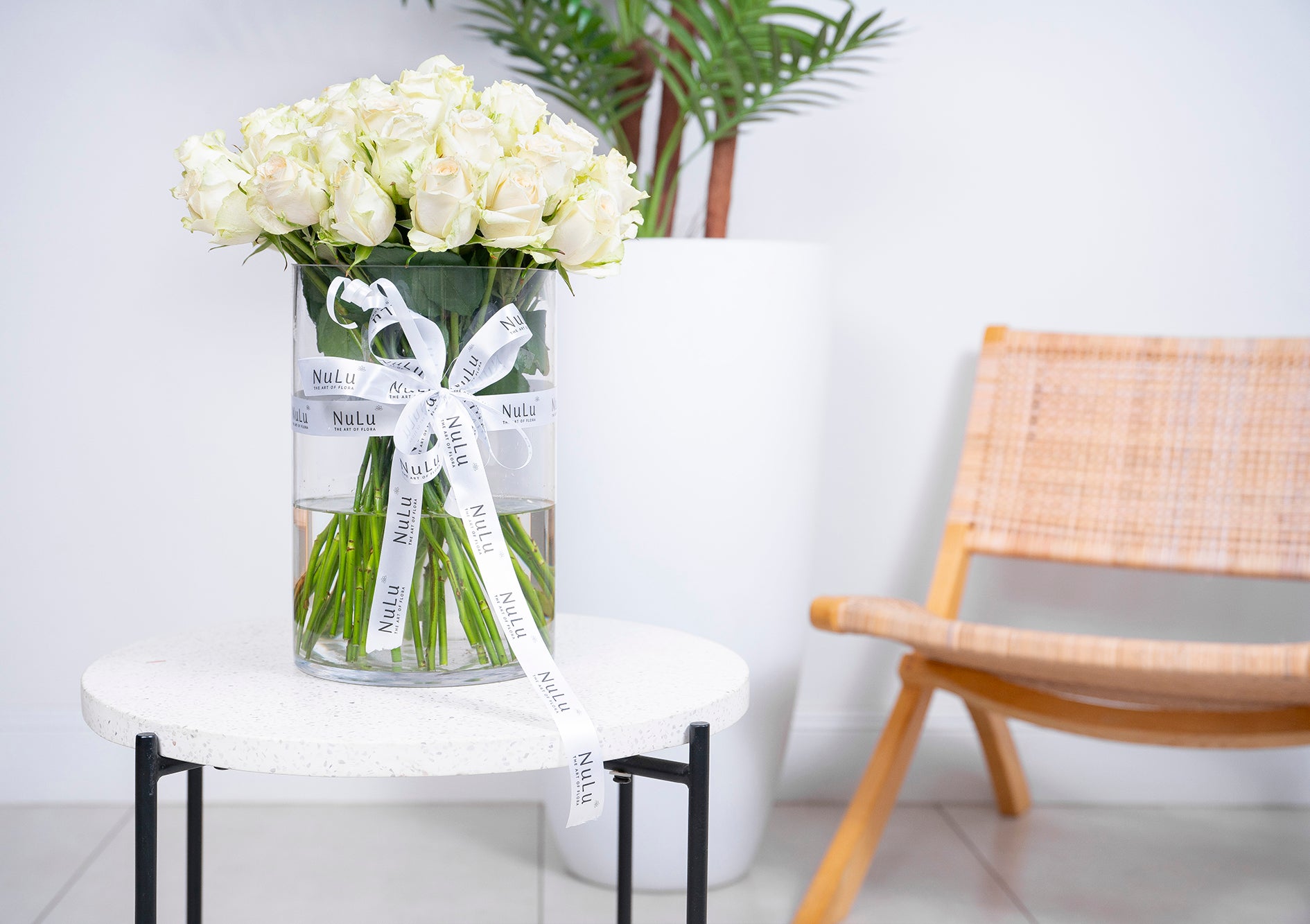 WHITE ROSES IN A VASE