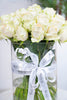 WHITE ROSES IN A VASE