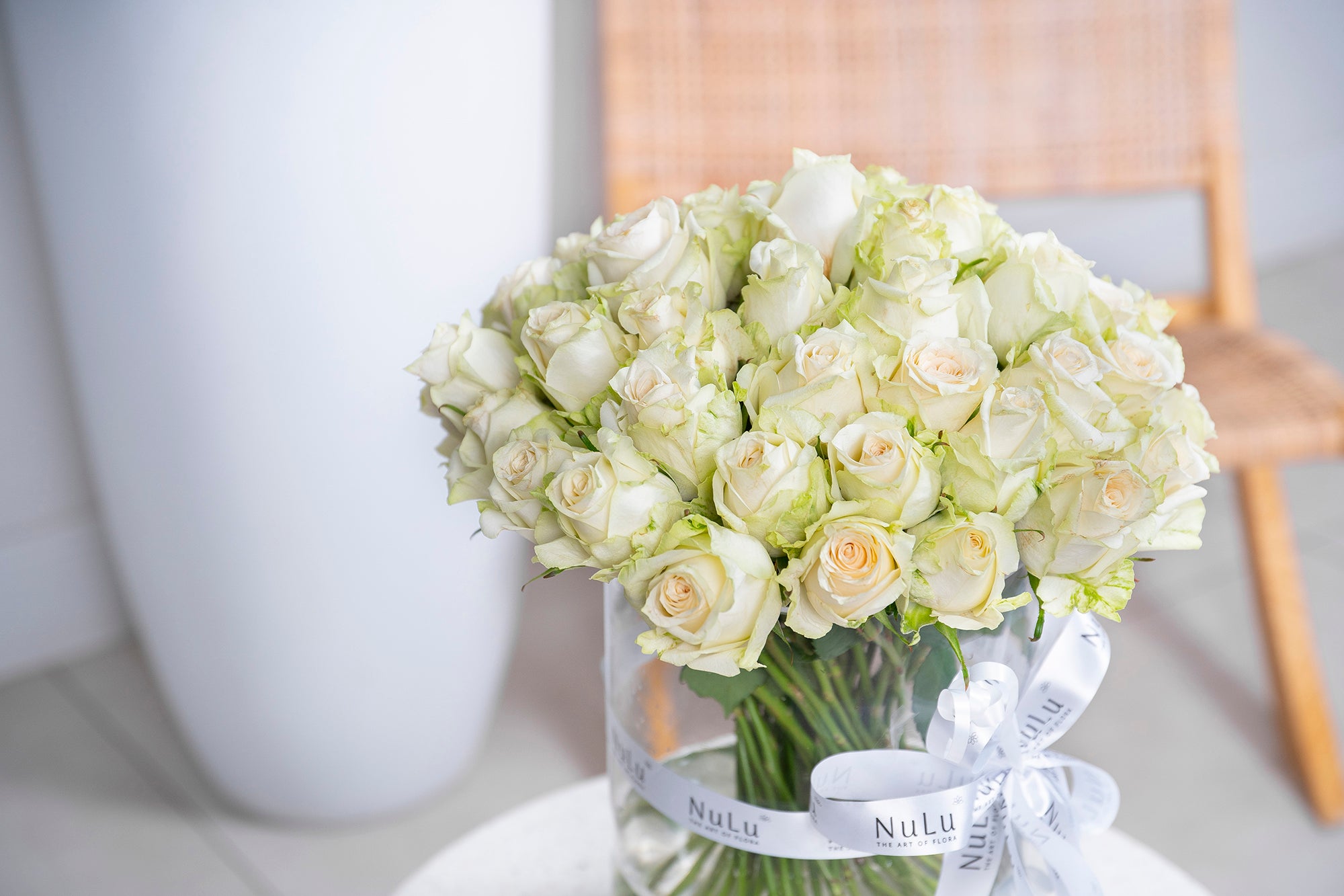 WHITE ROSES IN A VASE