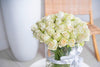 WHITE ROSES IN A VASE